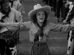 Judy Garland belts out a song in Pigskin Parade.