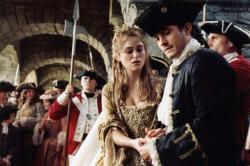 Keira Knightley and Orlando Bloom in Pirates of the Caribbean: Dead Man's Chest. Keira Knightley and Orlando Bloom in Pirates of the Caribbean: Dead Man's Chest.