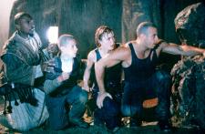 Keith David, Rhiana Griffith, Radha Mitchell and Vin Diesel in Pitch Black.