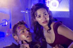 Mike Vogel and Emmy Rossum in Poseidon.