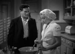 John Garfield and Lana Turner in The Postman Always Rings Twice. John Garfield and Lana Turner in The Postman Always Rings Twice.