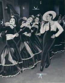 Paulette Goddard as a crossdressing caballero in one of the musical numbers from Pot o' Gold. Paulette Goddard as a crossdressing caballero in one of the musical numbers from Pot o' Gold.