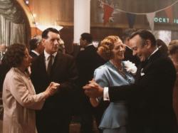 Liz Smith, Michael Palin, Maggie Smith, and Denholm Elliott in A Private Function. Liz Smith, Michael Palin, Maggie Smith, and Denholm Elliott in A Private Function.