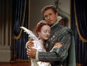 Bette Davis and Errol Flynn in The Private Lives of Elizabeth and Essex. Bette Davis and Errol Flynn in The Private Lives of Elizabeth and Essex.