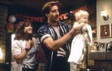 Nicolas Cage and Holly Hunter in Raising Arizona. Nicolas Cage and Holly Hunter in Raising Arizona.