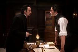 John Cusack and Luke Evans in The Raven.