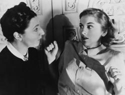 Judith Anderson as Mrs. Danvers scares the shit out of Joan Fontaine in Rebecca.