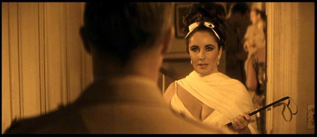 Marlon Brando about to get whipped by Elizabeth Taylor in Reflections in a Golden Eye Marlon Brando about to get whipped by Elizabeth Taylor in Reflections in a Golden Eye