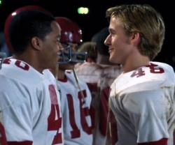 Donald Faison and Ryan Gosling in Remember the Titans.