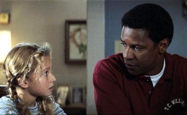 Hayden Panettiere and Denzel Washington in Remember the Titans.