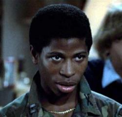 Larry B. Scott as Lamar Latrell in Revenge of the Nerds.