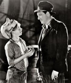 Mickey Rooney and Spencer Tracy in Riffraff. Mickey Rooney and Spencer Tracy in Riffraff.