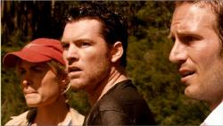 Radha Mitchell, Sam Worthington and Michael Vartan in Rogue