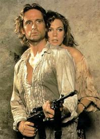 Michael Douglas and Kathleen Turner in Romancing the Stone. Michael Douglas and Kathleen Turner in Romancing the Stone.