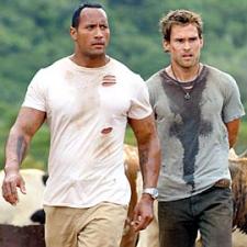 The Rock makes Seann William Scott his bitch by keeping him in handcuffs. The Rock makes Seann William Scott his bitch by keeping him in handcuffs.