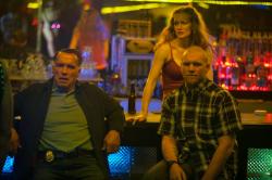 Arnold Schwarzenegger, Mireille Enos and Sam Worthington in Sabotage