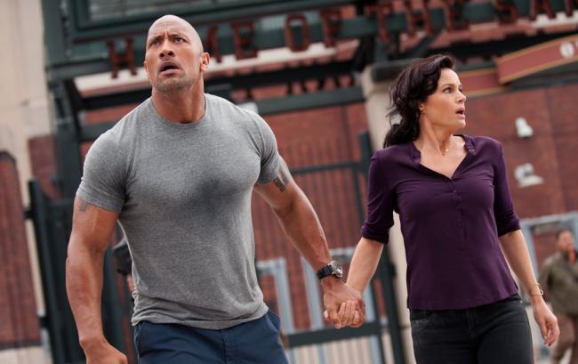 Dwayne Johnson and Carla Gugino in San Andreas.