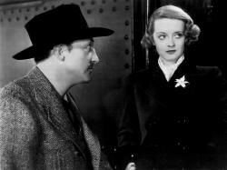 Warren William and Bette Davis in Satan Met a Lady.