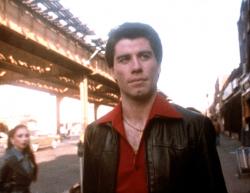 John Travolta as Tony Manero in Saturday Night Fever. John Travolta as Tony Manero in Saturday Night Fever.