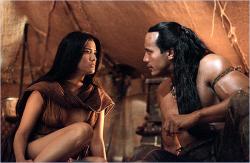 Dwayne Johnson and Kelly Hu in The Scorpion King. Dwayne Johnson and Kelly Hu in The Scorpion King.