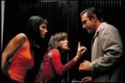 Courteney Cox, Parker Posey and David Arquette in Scream 3. Courteney Cox, Parker Posey and David Arquette in Scream 3.