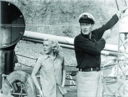 Lana Turner and John Wayne in The Sea Chase.