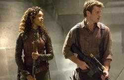 Gina Torres and Nathan Fillion in Serenity. Gina Torres and Nathan Fillion in Serenity.