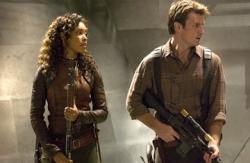 Gina Torres and Nathan Fillion in Serenity.