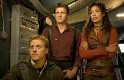 Alan Tudyk, Nathan Fillion and Gina Torres in Serenity. Alan Tudyk, Nathan Fillion and Gina Torres in Serenity.