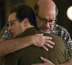 Larry Gopnick gets a big bear hug from Sy Ableman, his wife's boyfriend in A Serious Man.