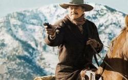 John Wayne living up to the title in The Shootist. John Wayne living up to the title in The Shootist.
