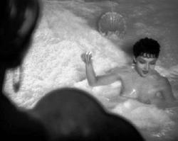 Claudette Colbert bathes in asses' milk in Cecil B. DeMille's The Sign of the Cross.