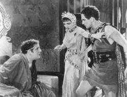 Charles Laughton, Claudette Colbert and Fredric March in Cecil B. DeMille's The Sign of the Cross. Charles Laughton, Claudette Colbert and Fredric March in Cecil B. DeMille's The Sign of the Cross.