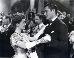 Bette Davis dances with Errol Flynn in The Sisters. Bette Davis dances with Errol Flynn in The Sisters.
