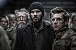 Chris Evans and Jamie Bell in Snowpiercer