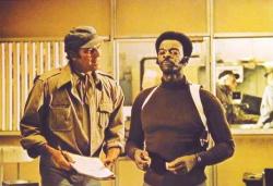 Charlton Heston and Brock Peters wearing very 1970s attire in the supposedly futuristic Soylent Green.