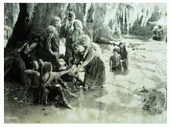 Mary Pickford as Molly leads orphans through a swamp in Sparrows. Mary Pickford as Molly leads orphans through a swamp in Sparrows.
