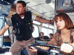 Keanu Reeves and Sandra Bullock in Speed.