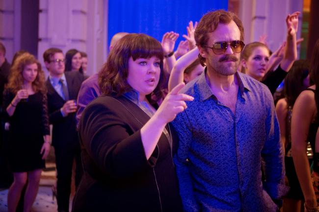 Melissa McCarthy and an in-disguise Jason Statham in Spy.