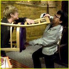 Jackie Chan is a pain in Lucas Tills neck.