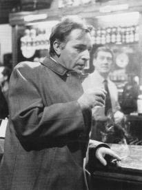 Richard Burton drinks and smokes in The Spy Who Came in from the Cold. Richard Burton drinks and smokes in The Spy Who Came in from the Cold.