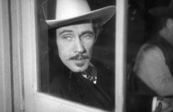 John Carradine as Hatfield, the gambler with a shady past in Stagecoach. John Carradine as Hatfield, the gambler with a shady past in Stagecoach.
