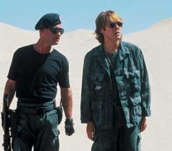 Kurt Russell and James Spader in Stargate. Kurt Russell and James Spader in Stargate.