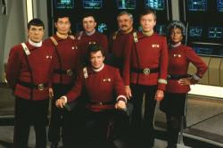 The seven iconic crewmembers of the Starship Enterprise in Star Trek V: The Final Frontier.