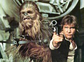 Peter Mayhew and Harrison Ford in Star Wars.