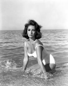 The ravishing Elizabeth Taylor enjoys the surf in Suddenly, Last Summer.