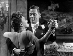 Gloria Swanson and William Holden in Sunset Boulevard. Gloria Swanson and William Holden in Sunset Boulevard.