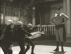 John T. Bambury, Tony Boris, Billy Curtis, and George Reeves in Superman and the Mole Men. John T. Bambury, Tony Boris, Billy Curtis, and George Reeves in Superman and the Mole Men.