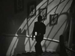 Cary Grant keeps to the shadows in Alfred Hitchcock's Suspicion. Cary Grant keeps to the shadows in Alfred Hitchcock's Suspicion.