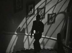 Cary Grant keeps to the shadows in Alfred Hitchcock's Suspicion.